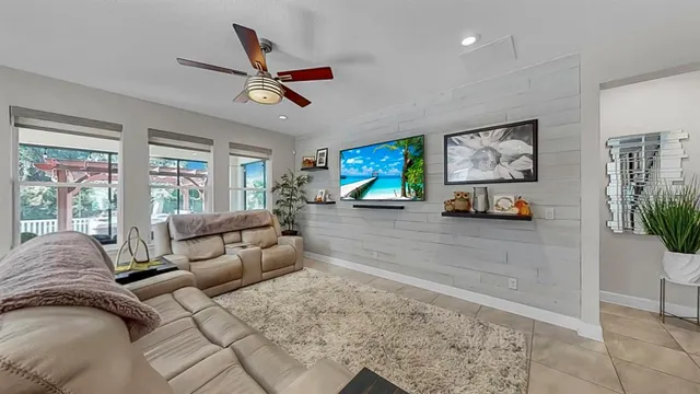 a spacious bedroom with a bed and a window