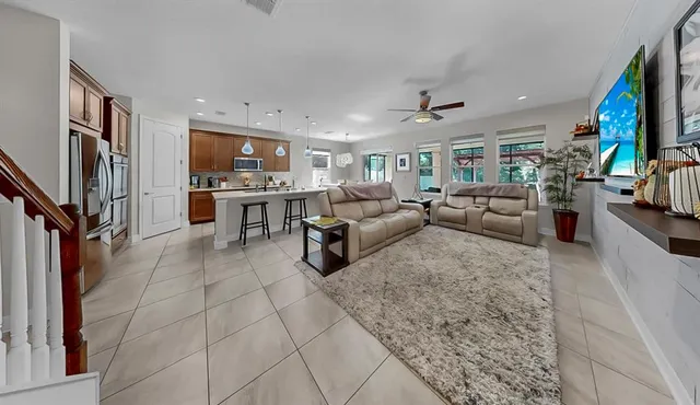 a spacious bathroom with a granite countertop tub and a sink