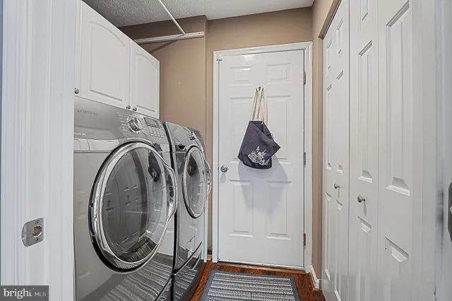 a bedroom with a bed and a closet