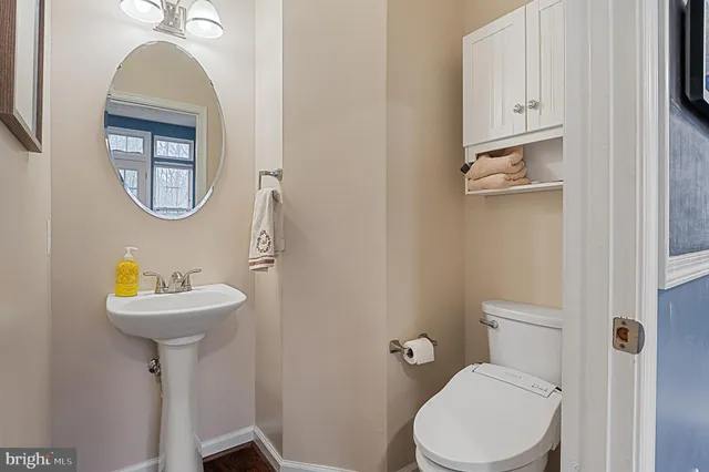 a workspace with a flat screen tv and a fireplace