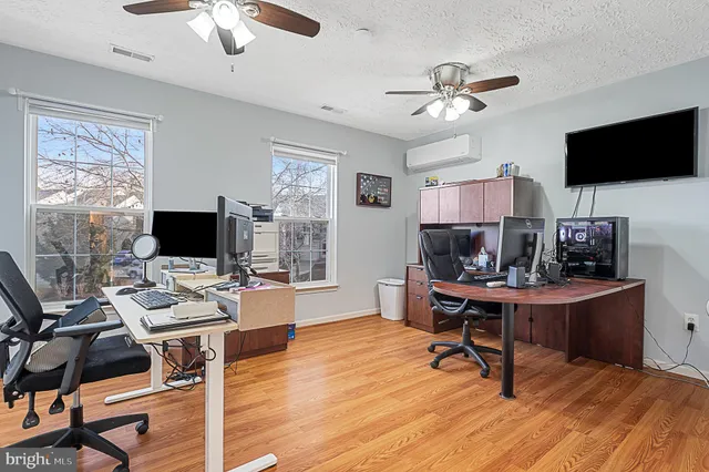 a picture of a wall with a white wall and a picture