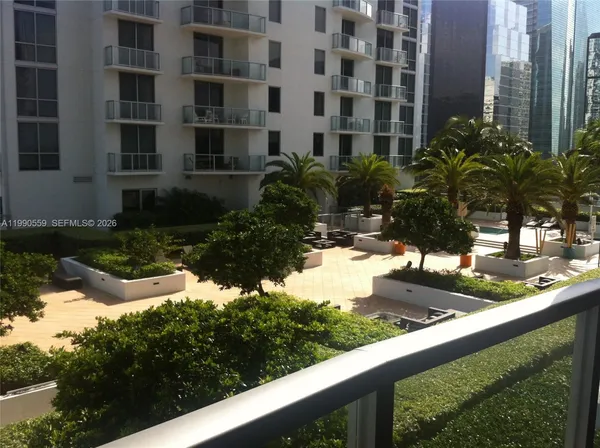 a view of a back yard of the house