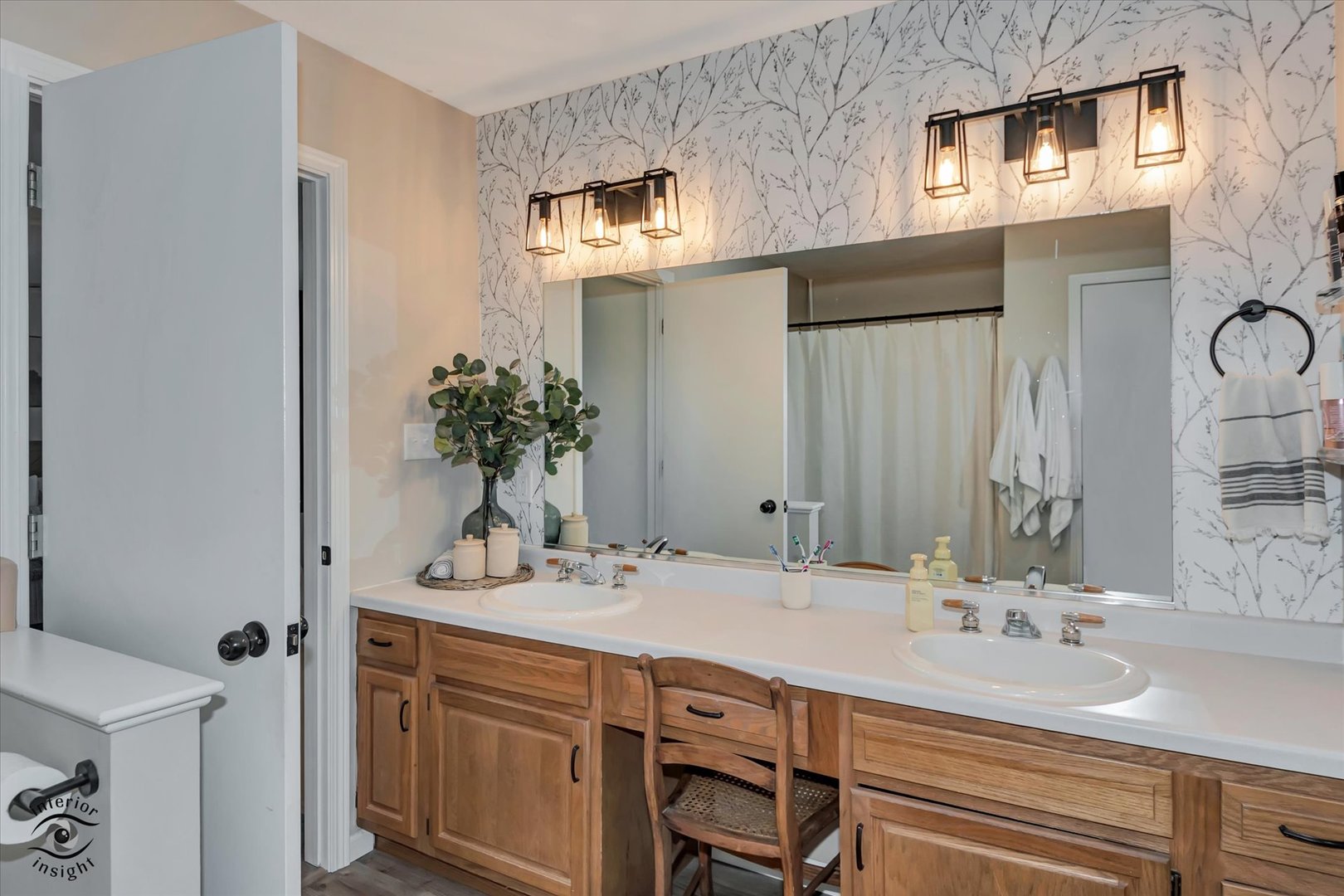 426 South Walnut Street Manteno, IL 60950 - Photo 16 of 26 a bathroom with a sink and a mirror