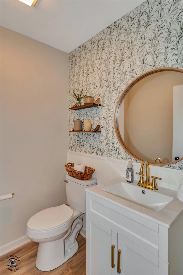426 South Walnut Street Manteno, IL 60950 - Photo 21 of 26 a bathroom with a sink and a mirror