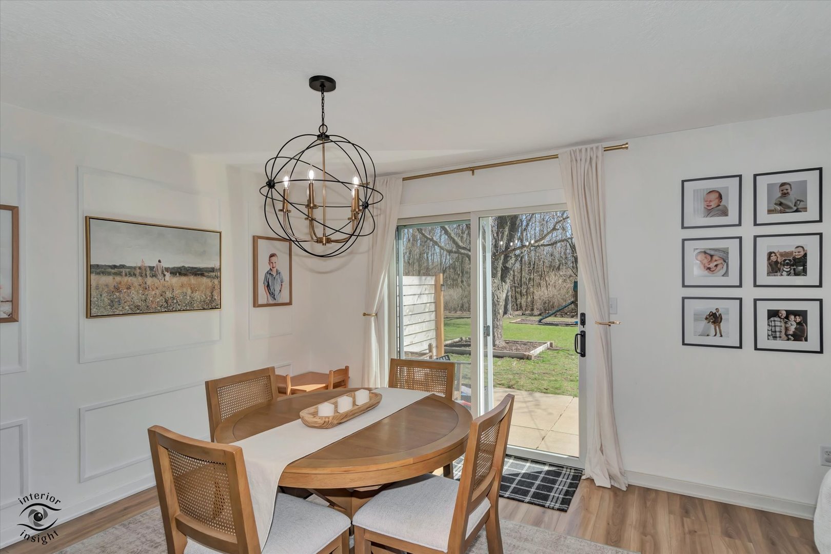 426 South Walnut Street Manteno, IL 60950 - Photo 9 of 26 a dining room with furniture a chandelier and wooden floor