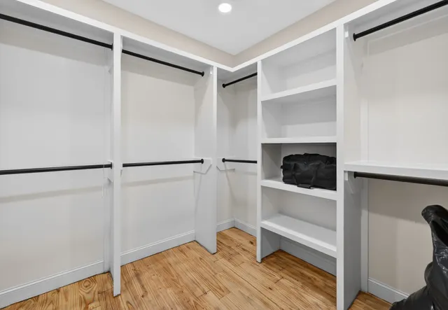 a kitchen with a refrigerator and a window