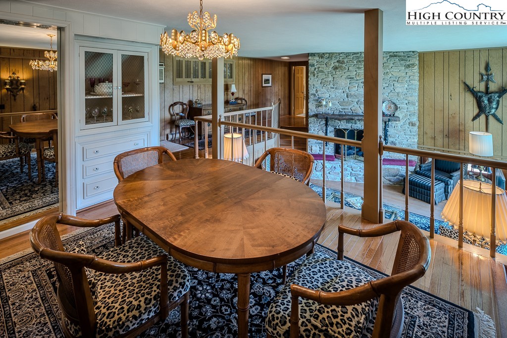122 Hornbeam Road Boone, NC 28607 - Photo 12 of 28 a view of a dining room with furniture window and outside view