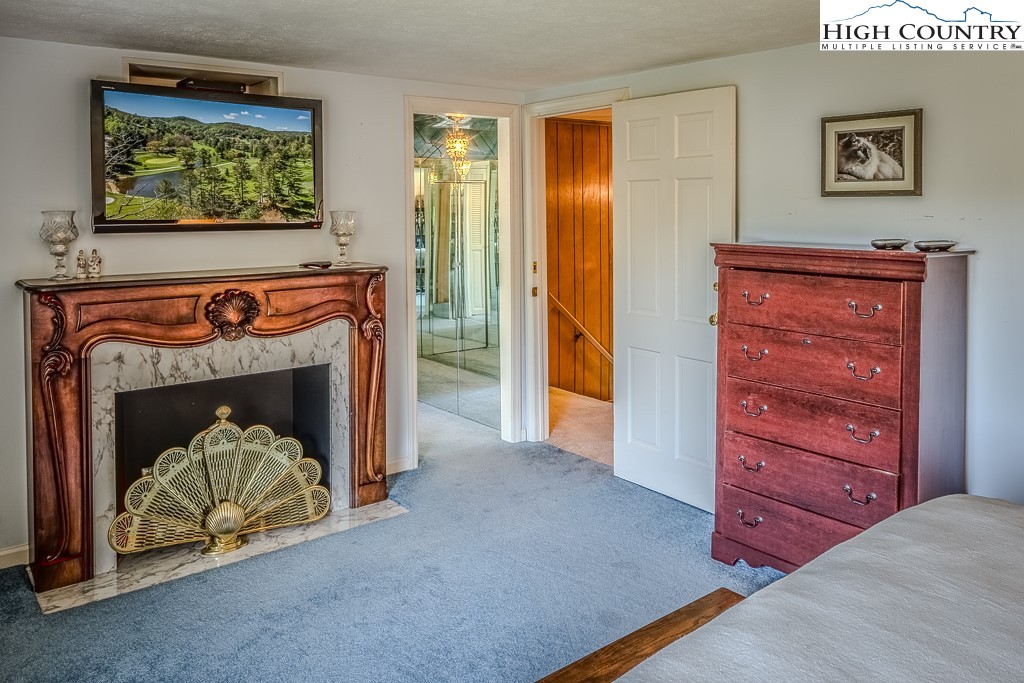 122 Hornbeam Road Boone, NC 28607 - Photo 21 of 28 a view of a livingroom with a fireplace and furniture