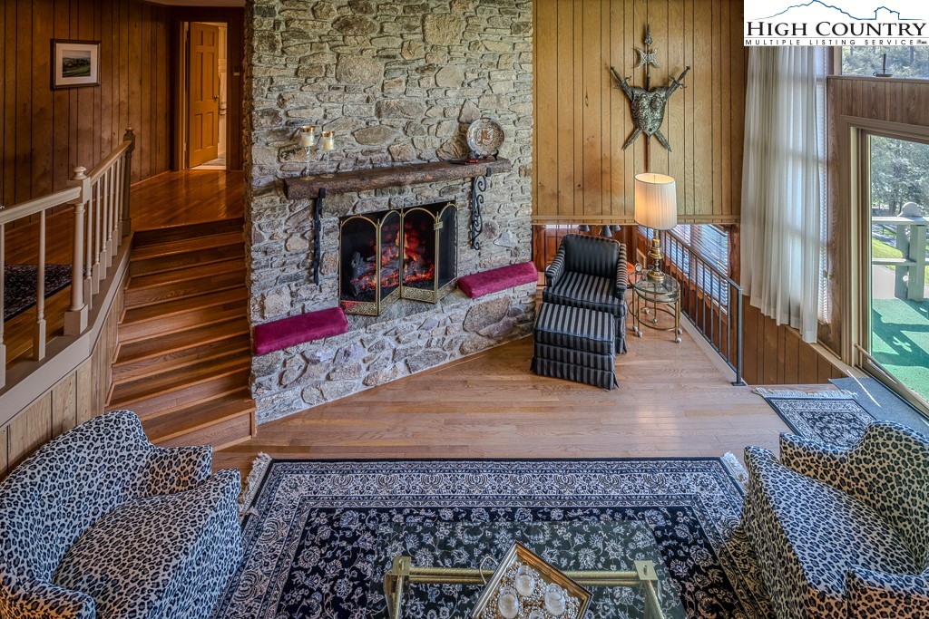 122 Hornbeam Road Boone, NC 28607 - Photo 8 of 28 a living room with furniture and a fireplace
