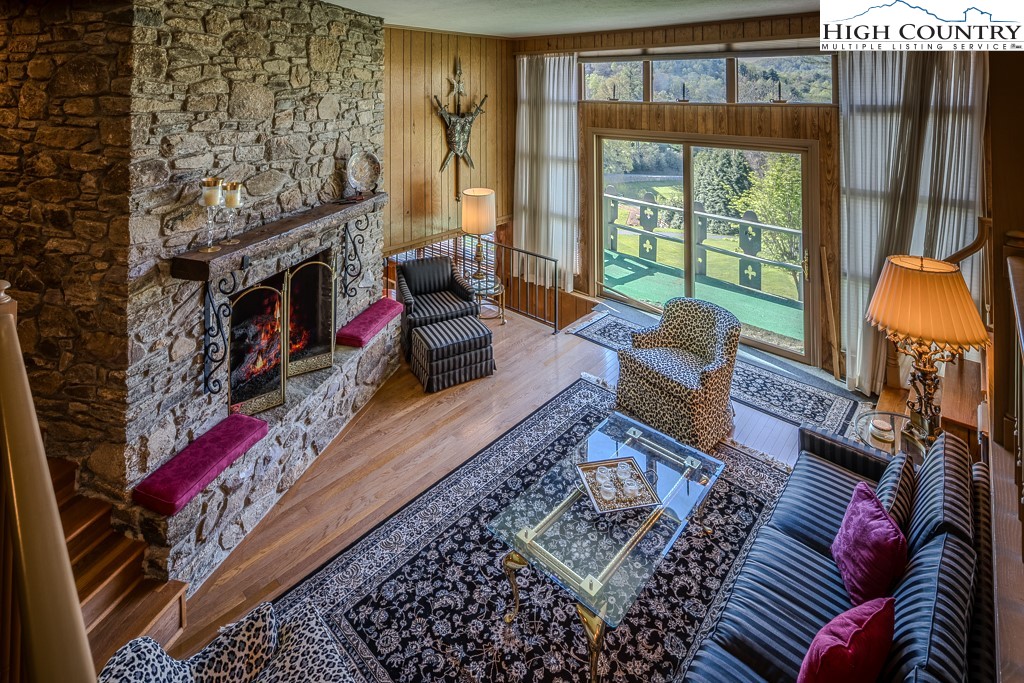 122 Hornbeam Road Boone, NC 28607 - Photo 9 of 28 a living room with furniture fireplace and flat screen tv