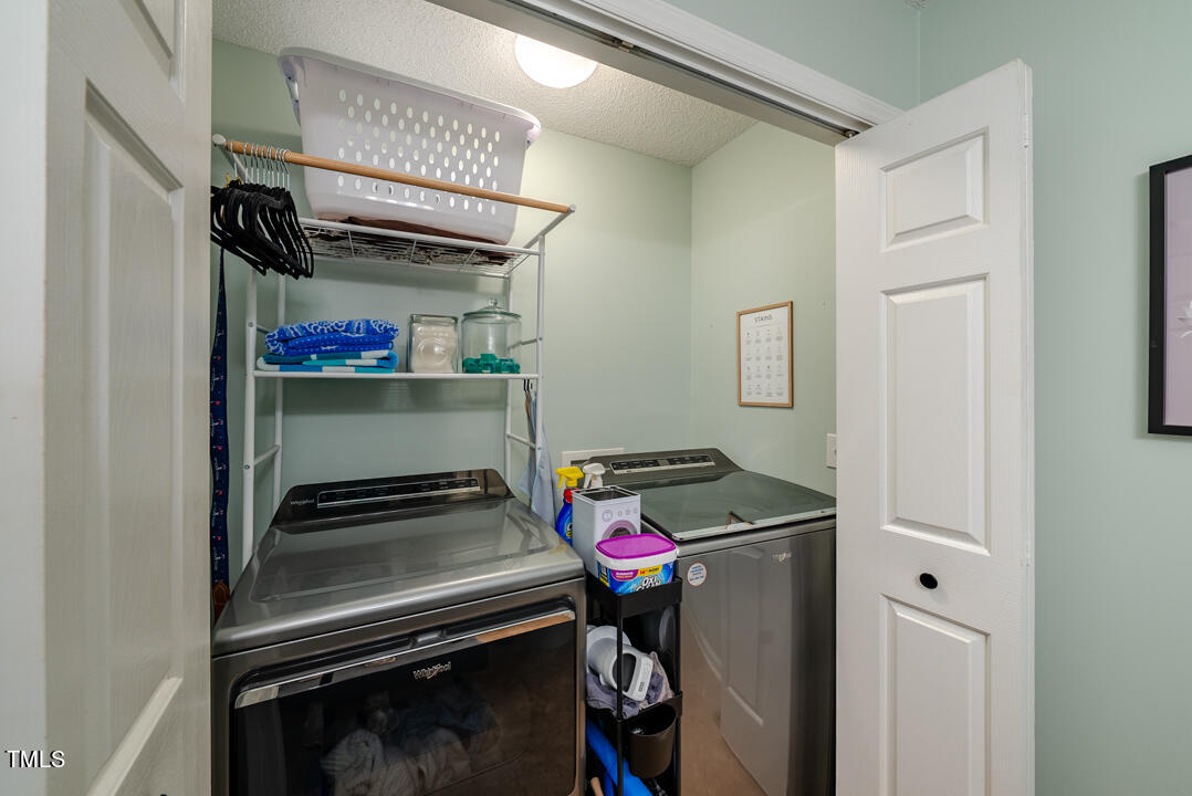 6806 Calais Drive Durham, NC 27712 - Photo 23 of 31 a room with storage and utility