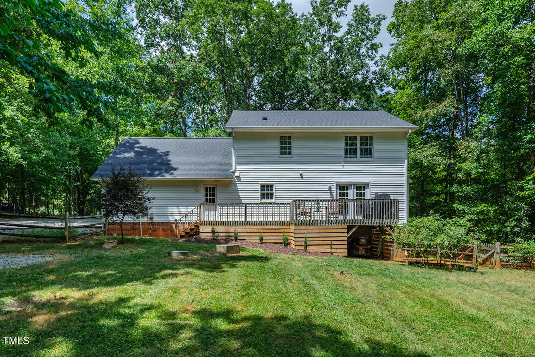 6806 Calais Drive Durham, NC 27712 - Photo 30 of 31 front view of a house with a yard