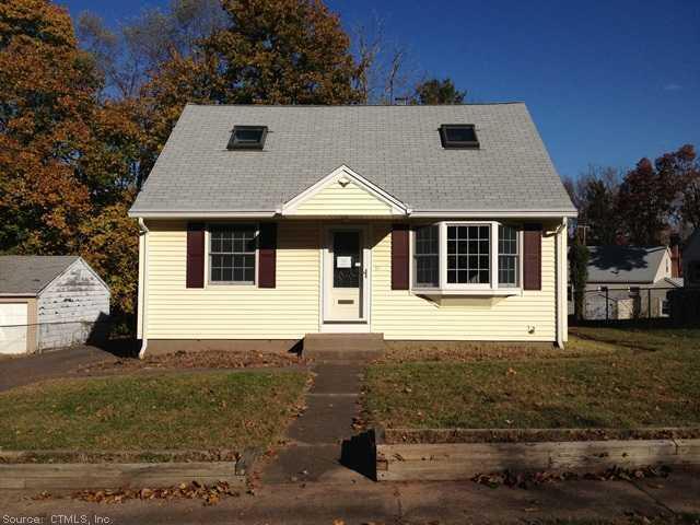 37 Jarvis Road Manchester, CT 06040 - Photo 1 of 1 a front view of a house with a yard
