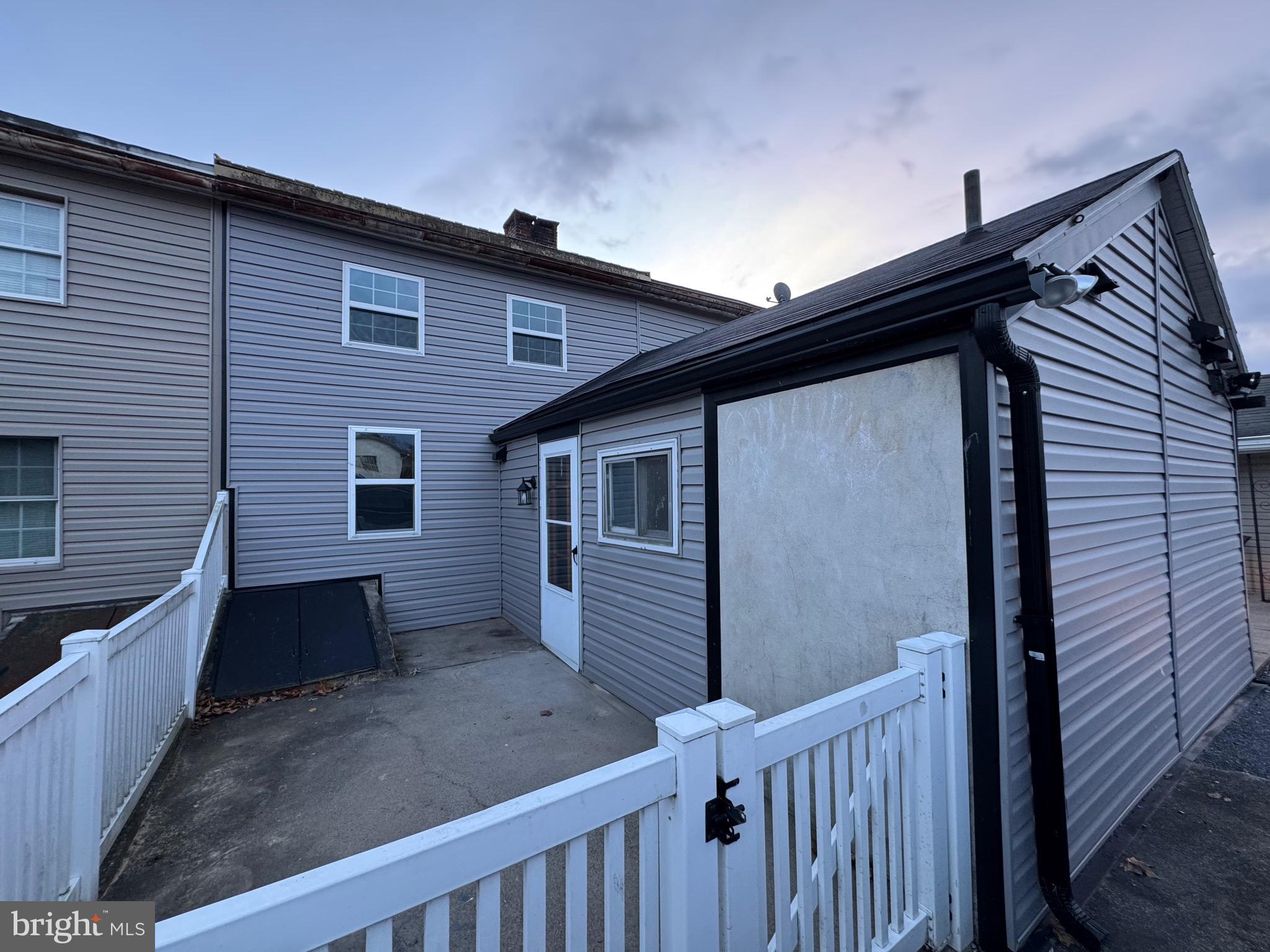 105 Spring Garden Street Leesport, PA 19533 - Photo 13 of 16 a view of a house and wooden deck