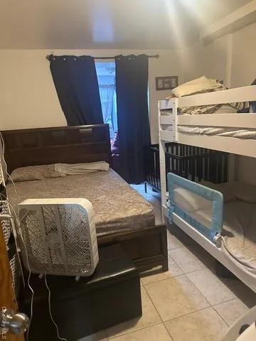 a bathroom with a toilet and shower