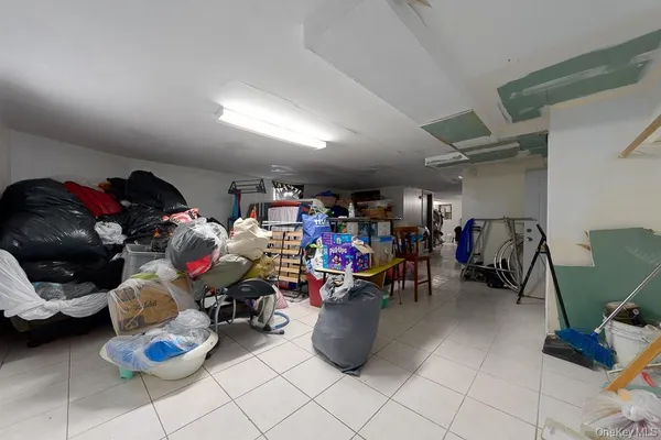 a room with gym equipment and lots of stuff