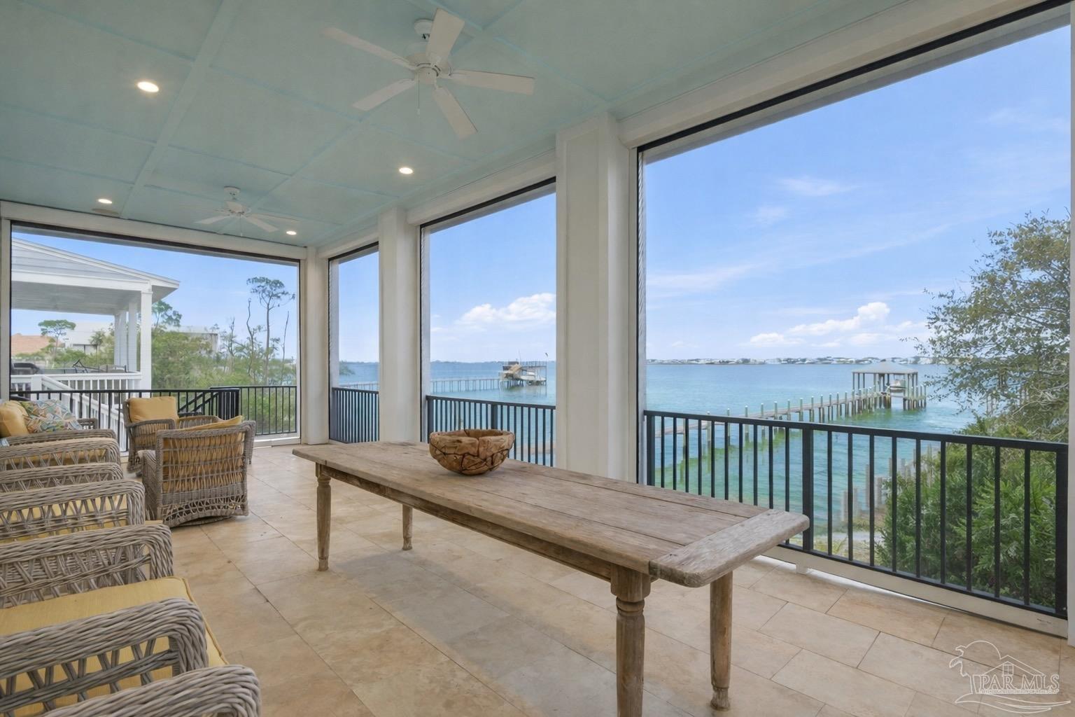 14520 River Road Perdido Key, FL 32507 - Photo 31 of 48 a balcony with furniture and a view