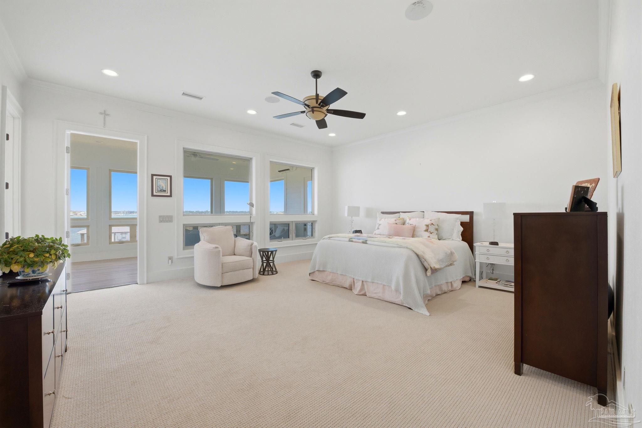 14520 River Road Perdido Key, FL 32507 - Photo 33 of 48 a bed room with bed and a chandelier