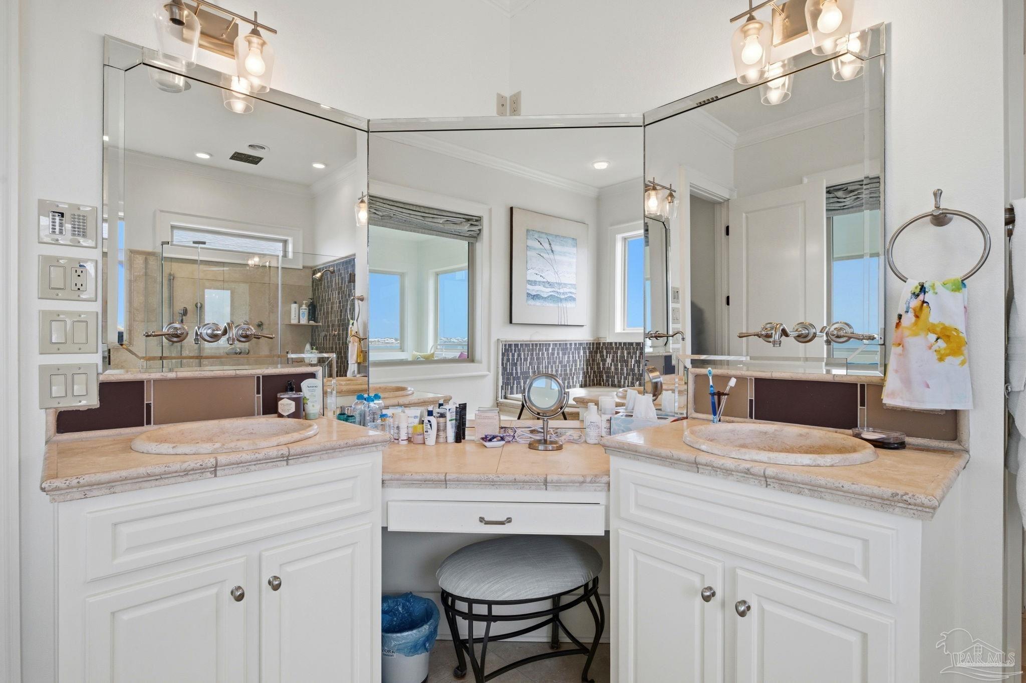 14520 River Road Perdido Key, FL 32507 - Photo 35 of 48 a bathroom with a sink double vanity and a mirror