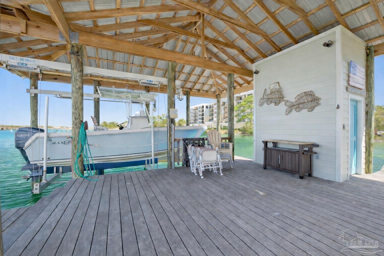 14520 River Road Perdido Key, FL 32507 - Photo 4 of 48 a room with furniture and a fireplace