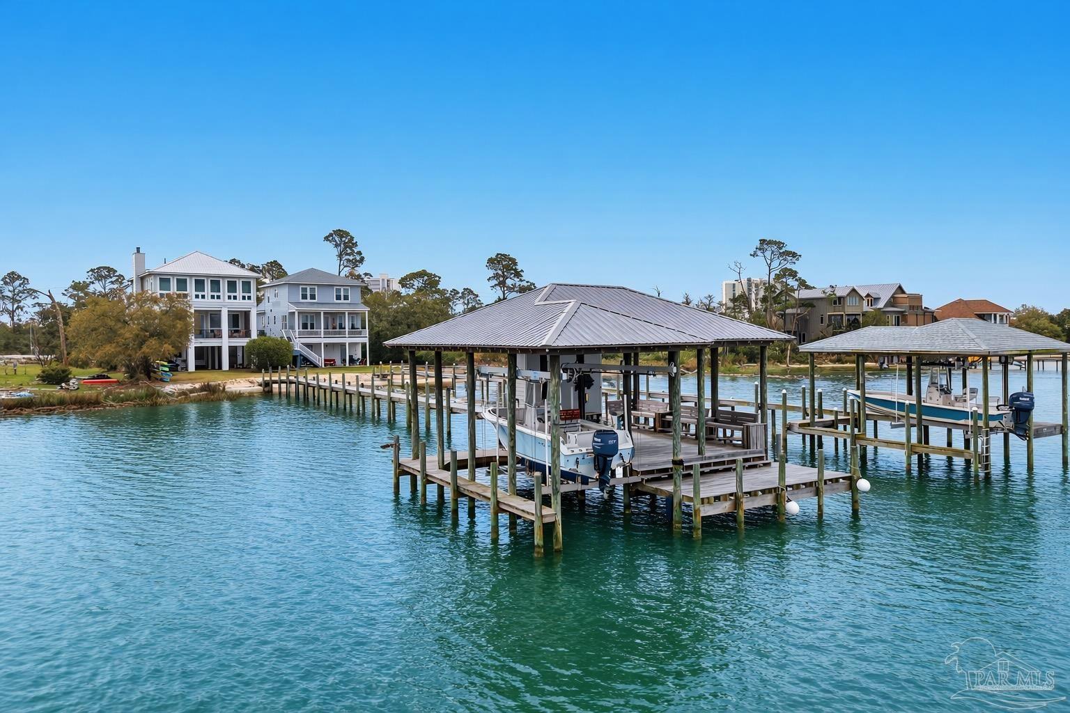 14520 River Road Perdido Key, FL 32507 - Photo 9 of 48 a view of a lake with sitting area
