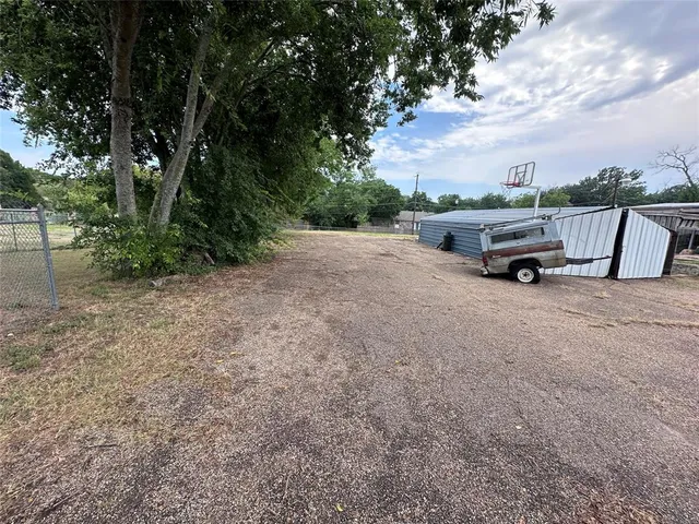 a view of outdoor space with truck parked