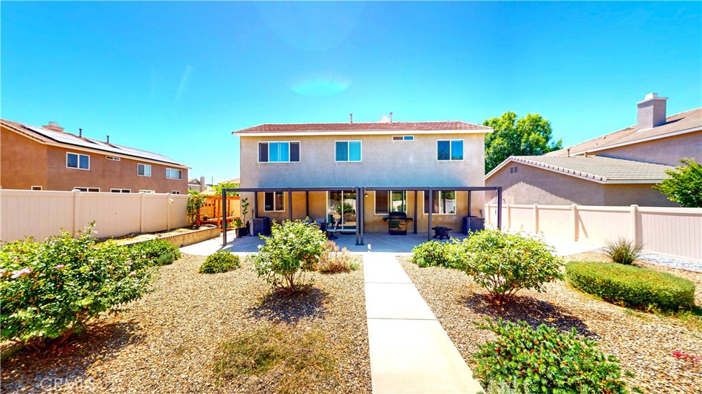 1279 Longbranch Road San Jacinto, CA 92582 - Photo 12 of 35 a front view of a house with garden