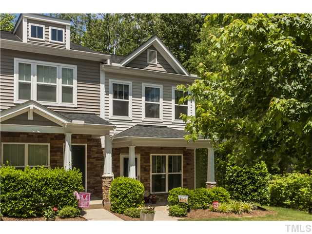 Built in 2008, This hard to find end unit has deep wooded views of Umstead Park from the backyard, side view and front view of this townhome!