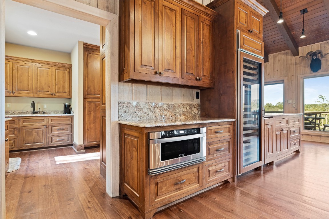 556 Cliff View-lot 53 Loop Harper, TX 78631 - Photo 14 of 40 a kitchen with stainless steel appliances granite countertop a stove and a sink