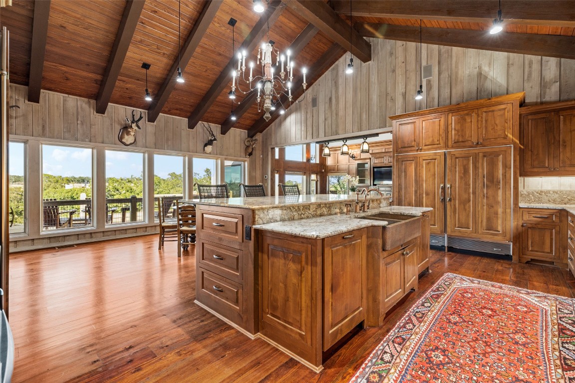 556 Cliff View-lot 53 Loop Harper, TX 78631 - Photo 15 of 40 a kitchen with stove and wooden floor