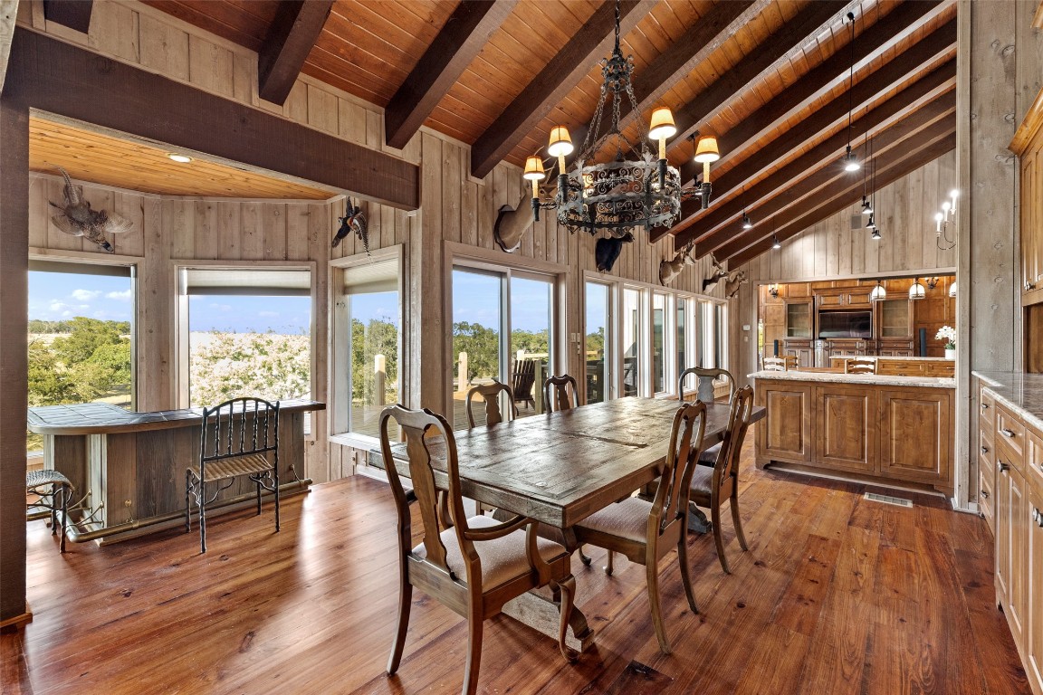 556 Cliff View-lot 53 Loop Harper, TX 78631 - Photo 16 of 40 a view of a dining room with furniture window and wooden floor
