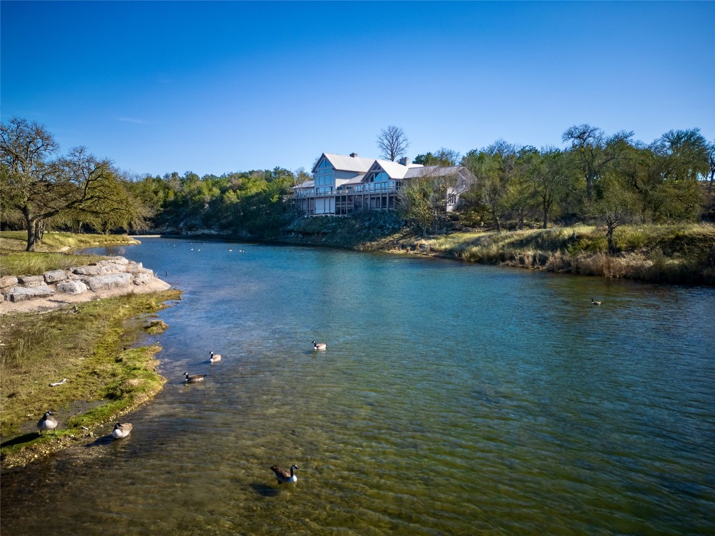 556 Cliff View-lot 53 Loop Harper, TX 78631 - Photo 2 of 40 a view of a lake with houses