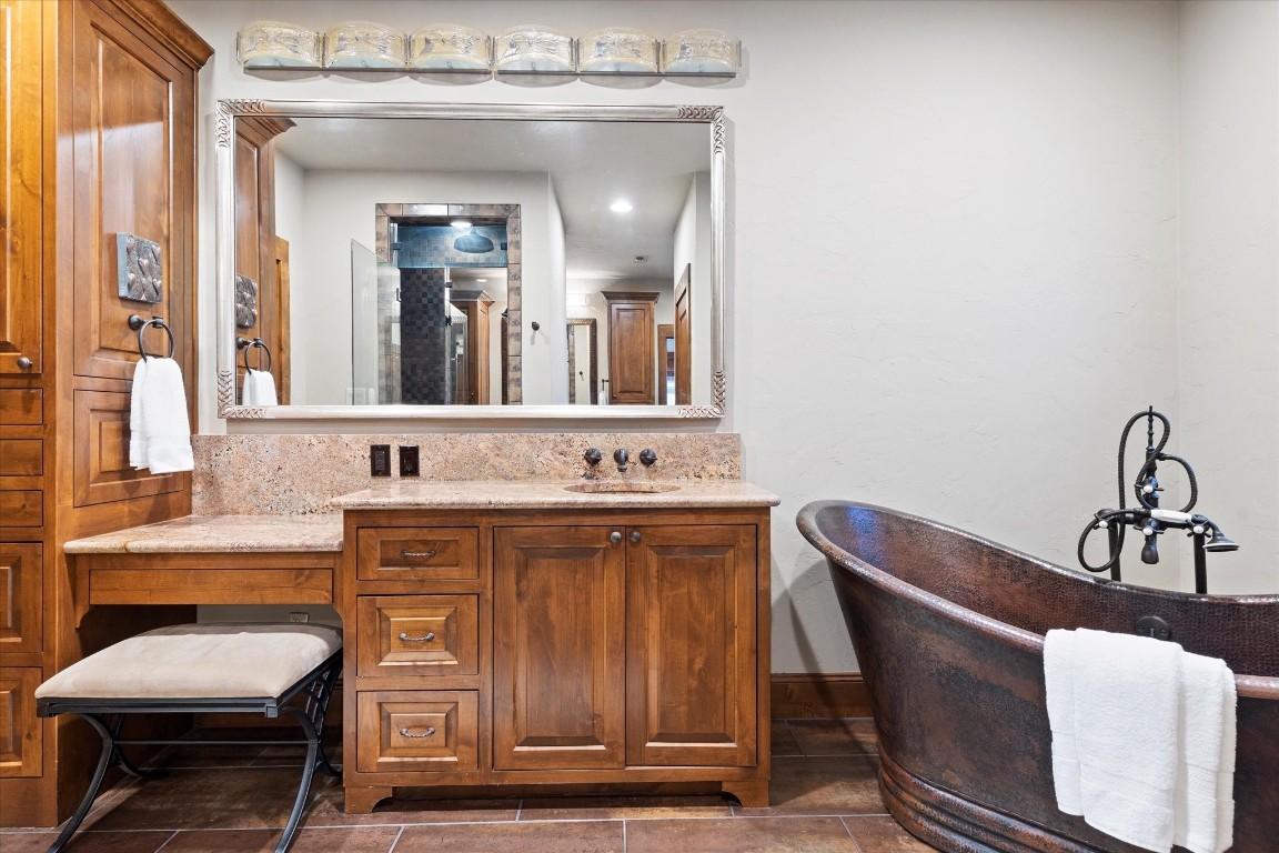 556 Cliff View-lot 53 Loop Harper, TX 78631 - Photo 23 of 40 a bathroom with a sink and a mirror