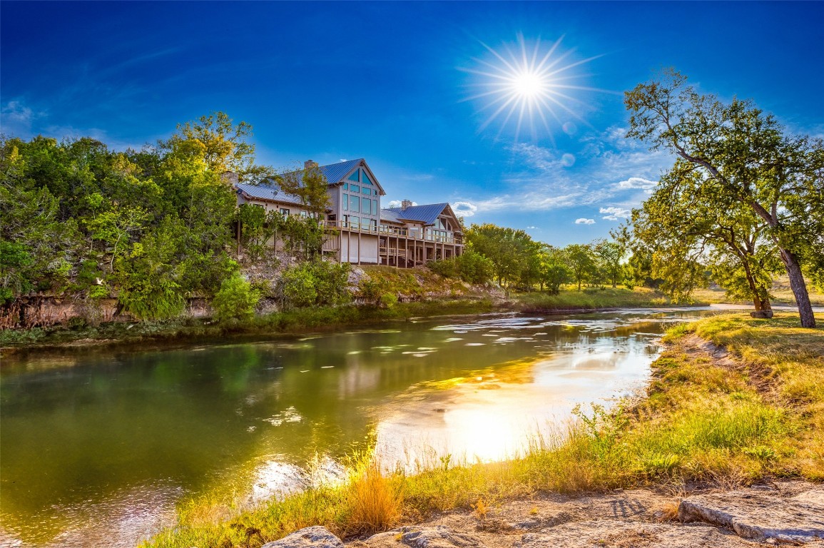 556 Cliff View-lot 53 Loop Harper, TX 78631 - Photo 8 of 40 a view of a lake with a yard