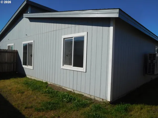 a house view with a backyard space
