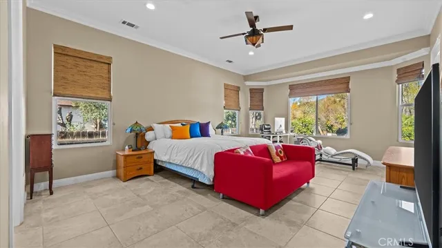 a bed room with a bed and a couch