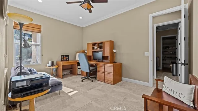 a view of a workspace with furniture