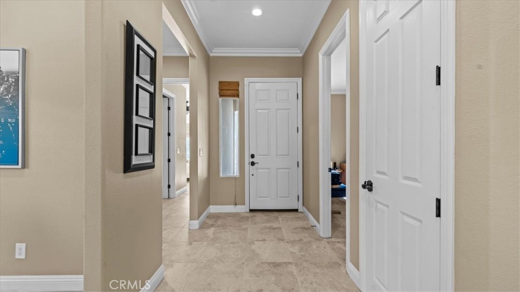 3059 Mill Creek Road Mentone, CA 92359 - Photo 24 of 39 a view of a hallway with closet and wooden floor