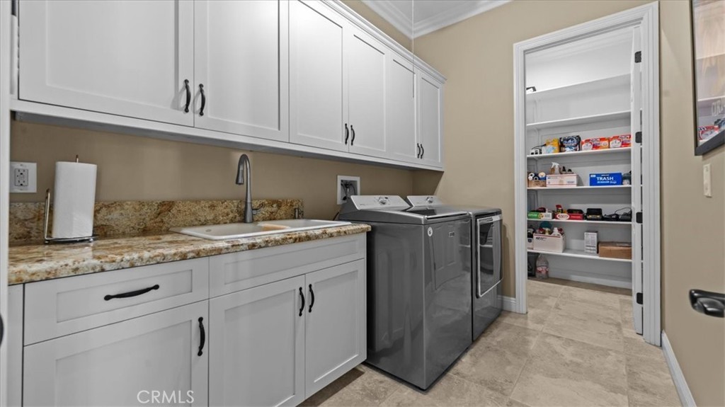 3059 Mill Creek Road Mentone, CA 92359 - Photo 25 of 39 a kitchen with cabinets appliances and a counter space