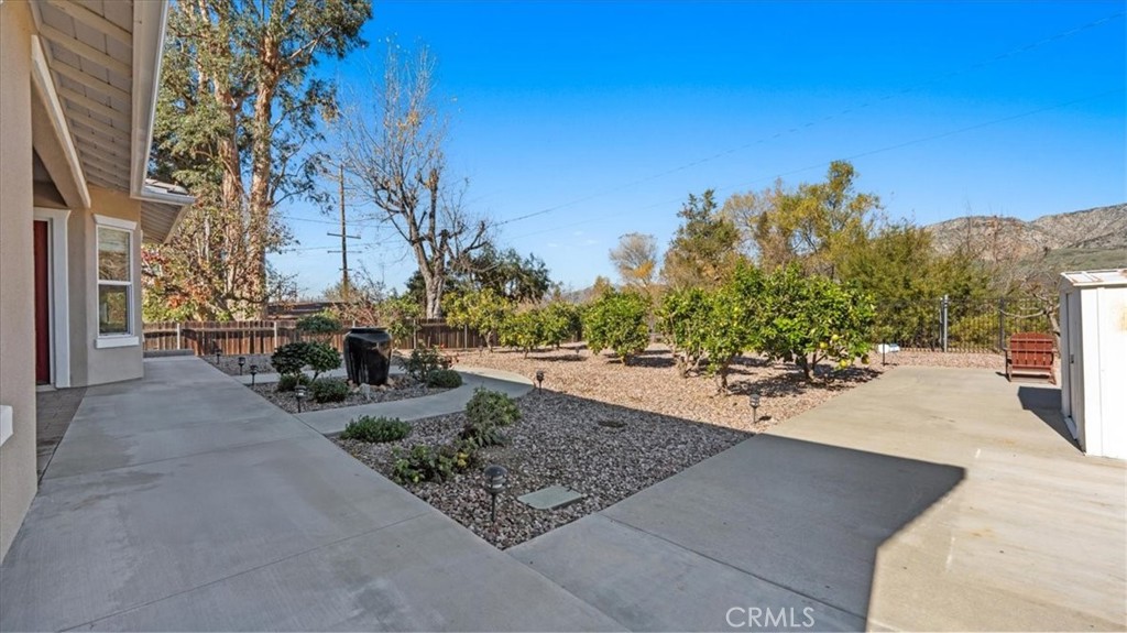 3059 Mill Creek Road Mentone, CA 92359 - Photo 29 of 39 a view of a backyard patio and fire pit