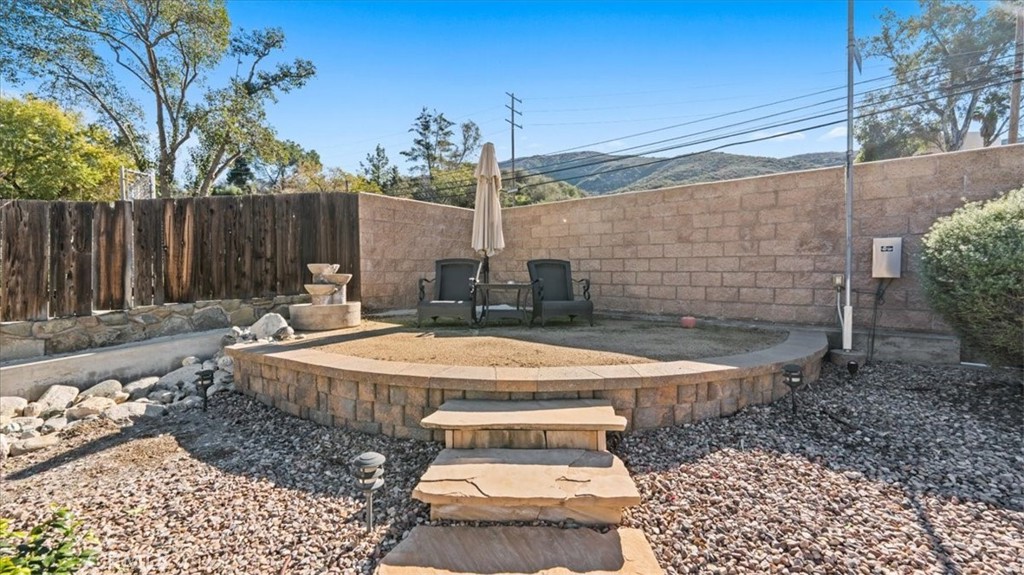 3059 Mill Creek Road Mentone, CA 92359 - Photo 31 of 39 a view of a backyard with a patio