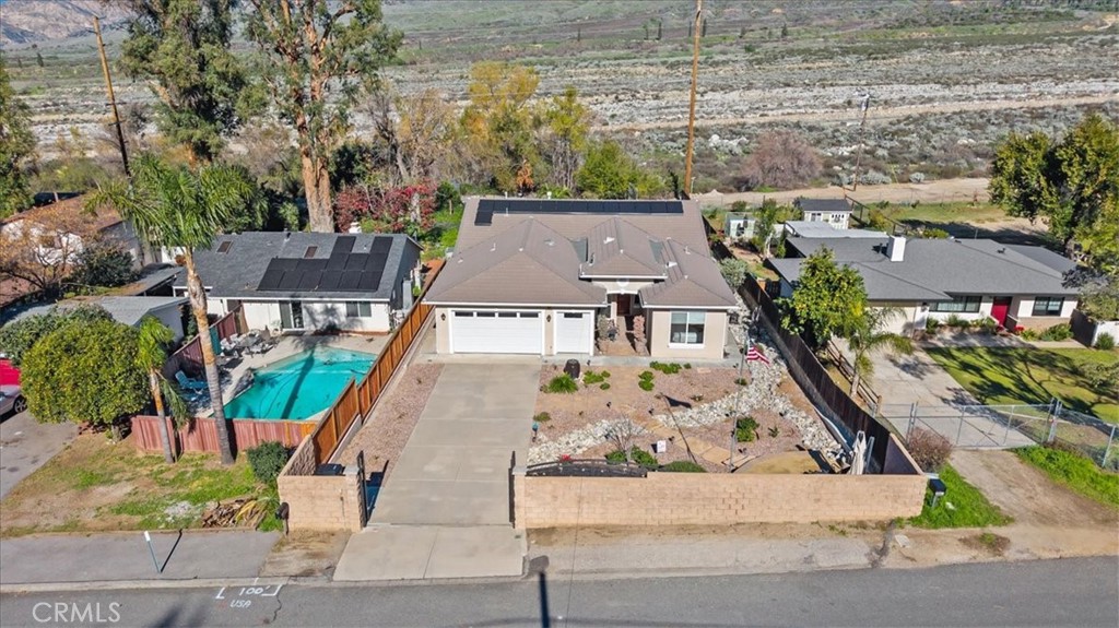 3059 Mill Creek Road Mentone, CA 92359 - Photo 33 of 39 an aerial view of multiple houses with a yard