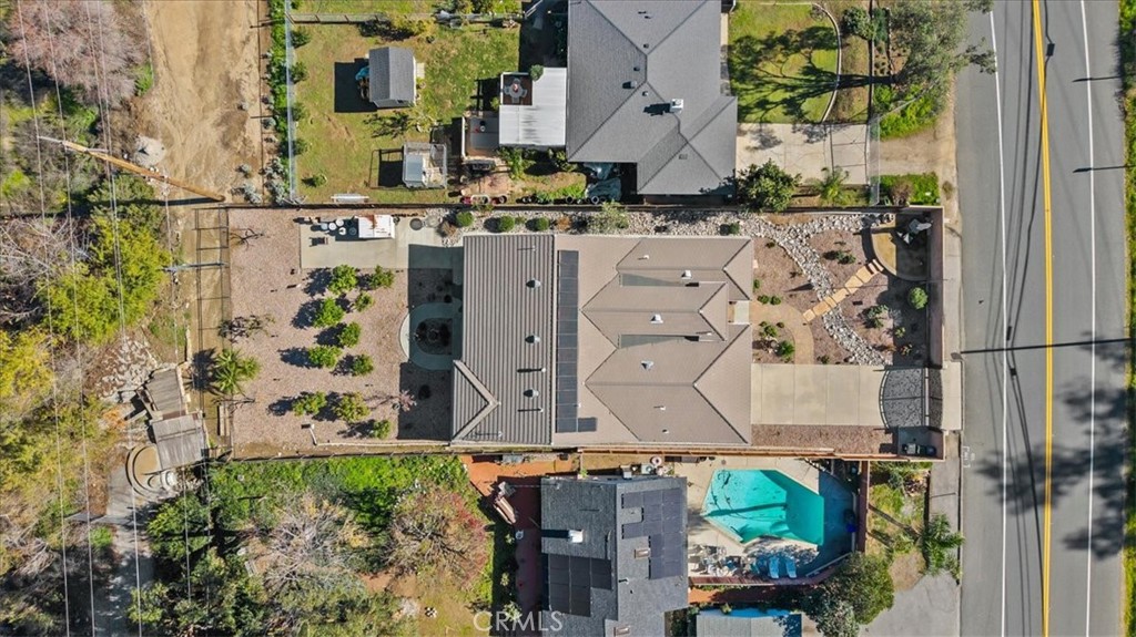 3059 Mill Creek Road Mentone, CA 92359 - Photo 36 of 39 an aerial view of a house with a yard and large trees