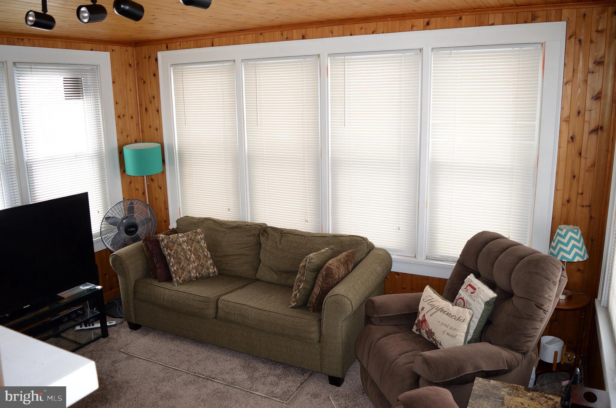 140 Case Avenue Sharon, PA 16146 - Photo 11 of 23 a living room with furniture and a flat screen tv