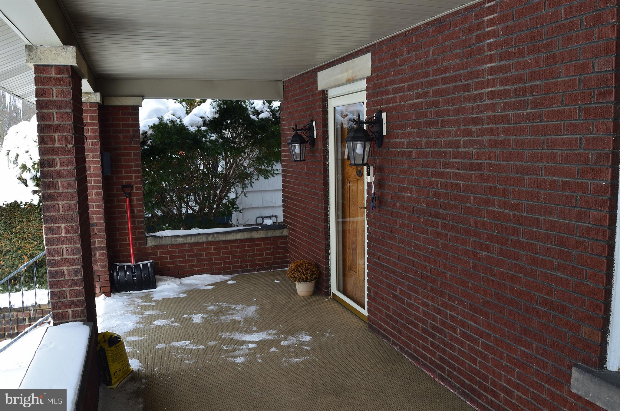 140 Case Avenue Sharon, PA 16146 - Photo 22 of 23 a view of a door with a bench in front of it