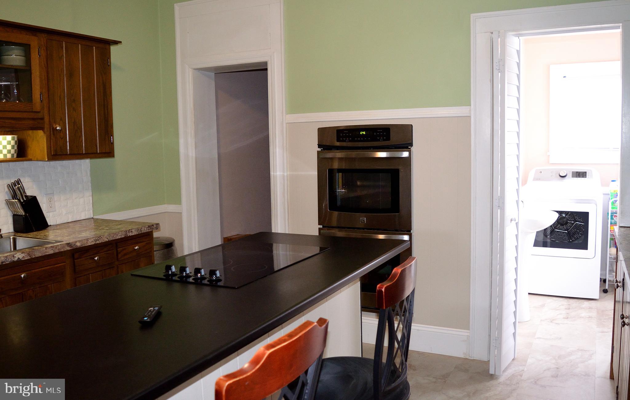 140 Case Avenue Sharon, PA 16146 - Photo 3 of 23 a kitchen with a sink and cabinets