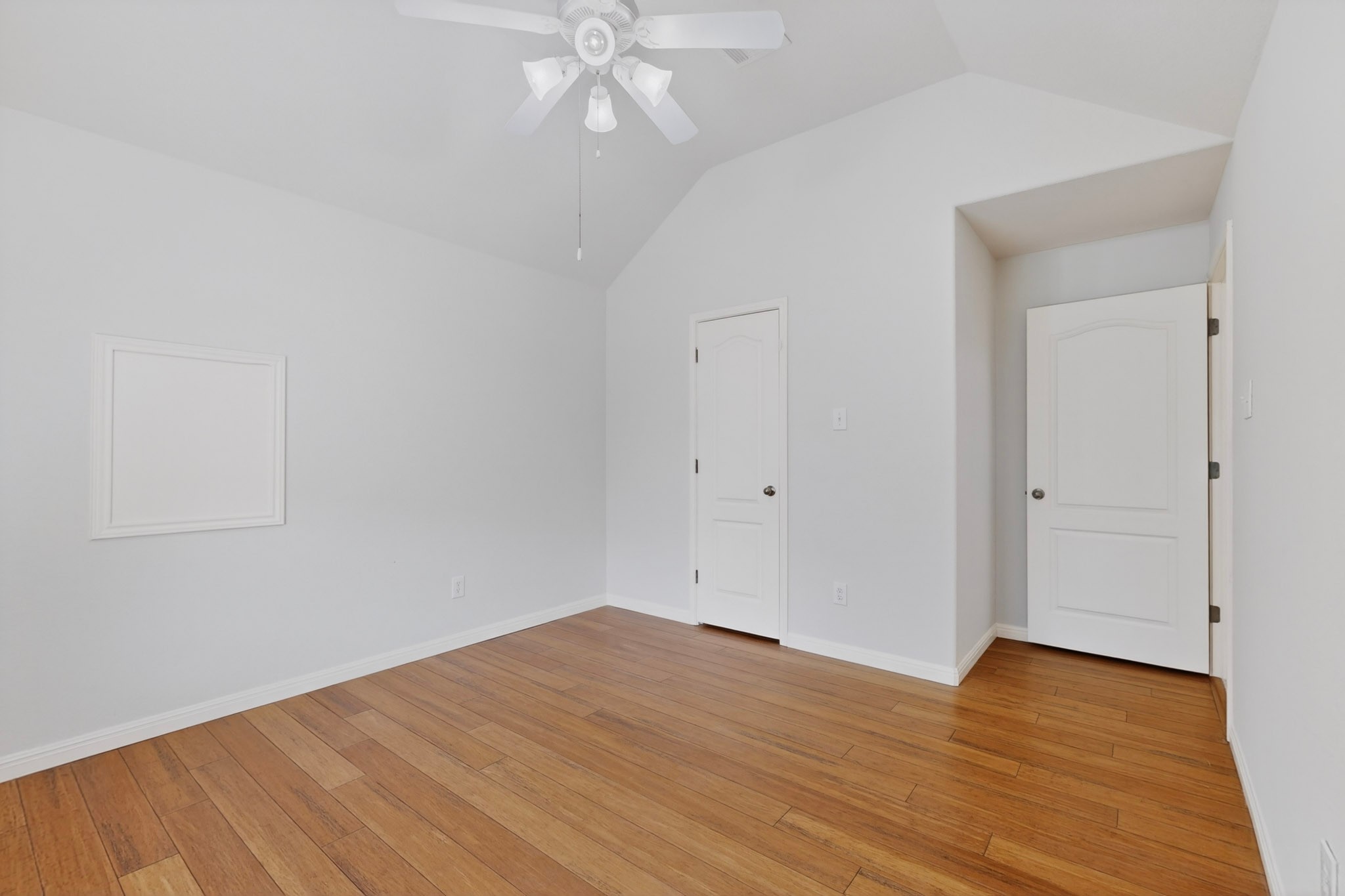 8617 Cobblestone Austin, TX 78735 - Photo 28 of 39 a view of an empty room with wooden floor