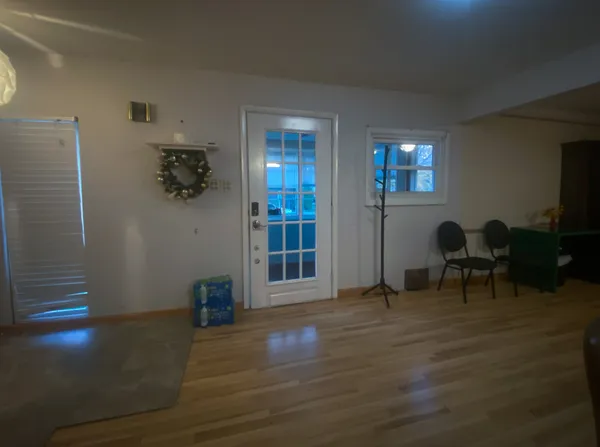 a view of livingroom with furniture and wooden floor