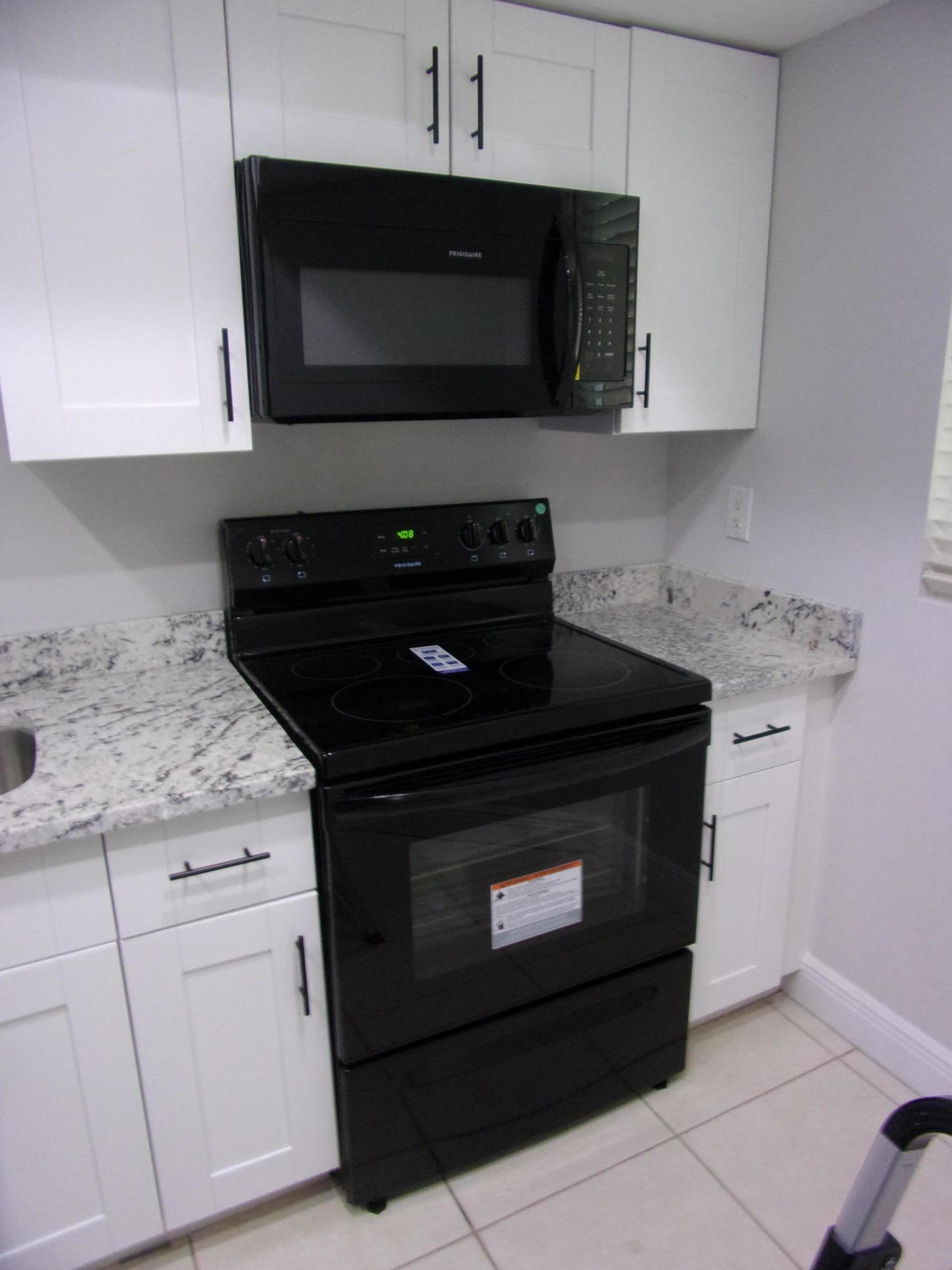 1505 Southeast Royal Green Circle, Unit U203 Port St. Lucie, FL 34952 - Photo 4 of 15 100_5253