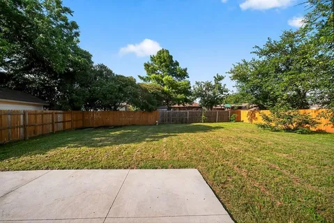 a view of a backyard with green space